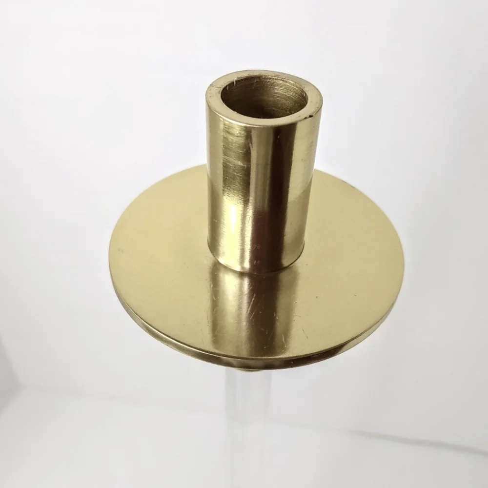 Creative Co-op tall acrylic/gold taper candle holder.